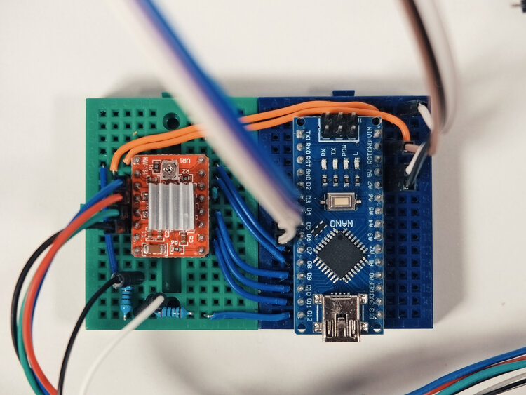 Figure 6: On the left is the stepper motor control board (item 2) and on the right is Arduino Nano (item 3), the resistors are used to dive voltage: horizontally placed is a 2k resistor and vertically place resistor is a 5k resistor. These are used to lower 5V to 3.3V.
