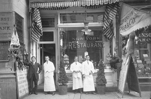 Employees of the New York Restaurant, which was at 916 E. Main St. in the financial district, break to be photographed by Cook Studio in the early 20th century. - THE VALENTINE