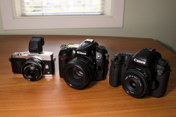 From left to Right: Olympus E-P5 with 17mm (35mm equivalent), Nikon D7000 with 50mm (75mm equivalent), and Canon 6D with 40mm (full frame—no crop factor).