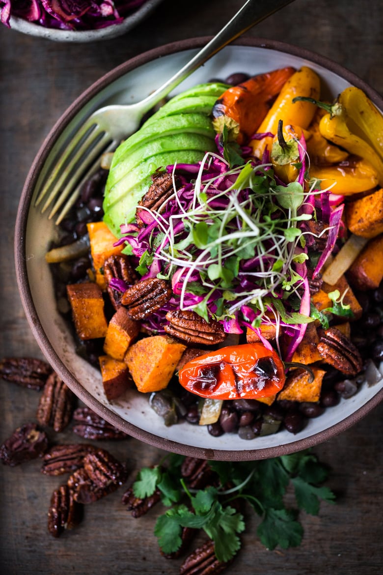 Our 20 BEST Buddha Bowls!| Mexican Oaxacan Bowl with roasted sweet potatoes, black beans, avocado, and cabbage slaw.