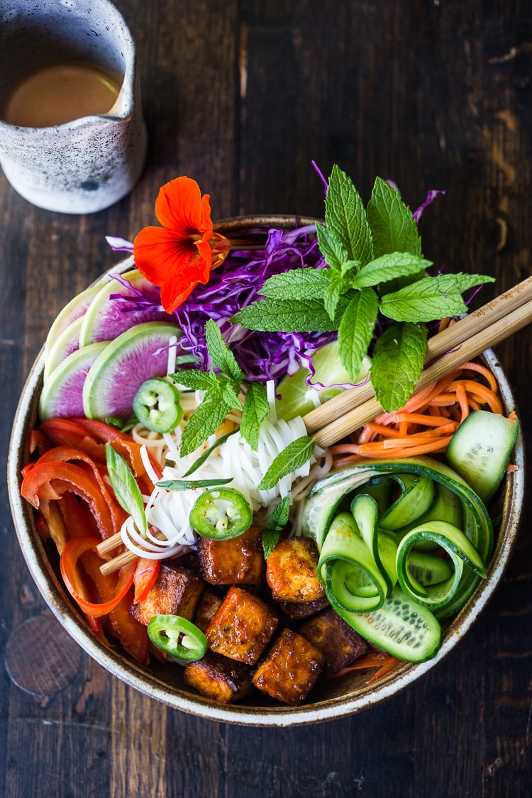 Our 20 BEST Buddha Bowls!|Fresh and delicious Vegan Bahn Mi Noodle Bowl with Sriracha Tofu, rice noodles, pickled carrots and radishes, crunchy cucumber and cabbage and a creamy vegan spicy Bahn Mi dressing! #bahnmi #healthybowl #noodlebowl #vegan #veganbowl #bahnmibowl #noodles