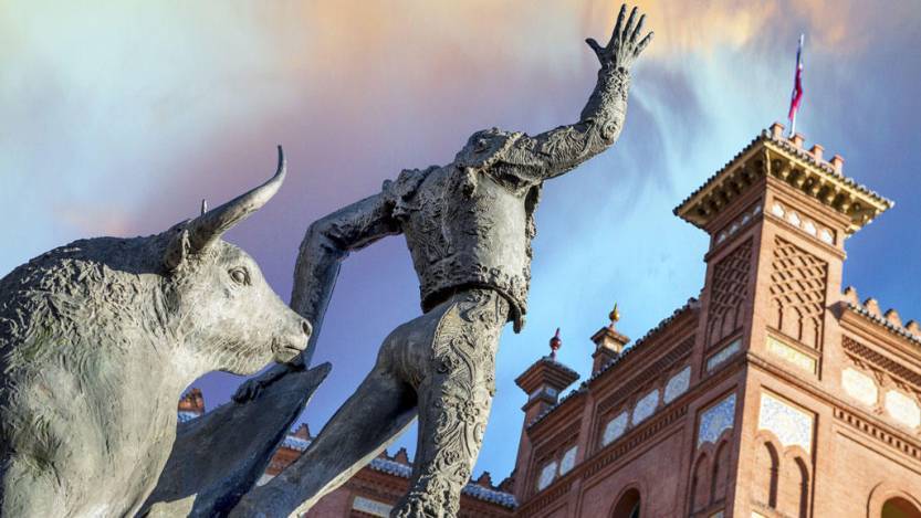 statues of a bull and a matador