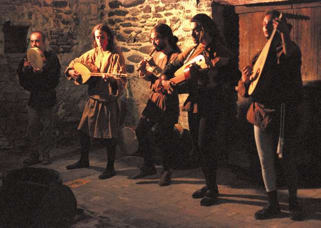 Musicians playing at the Feast of Fools in Torrechiara, Italy.
