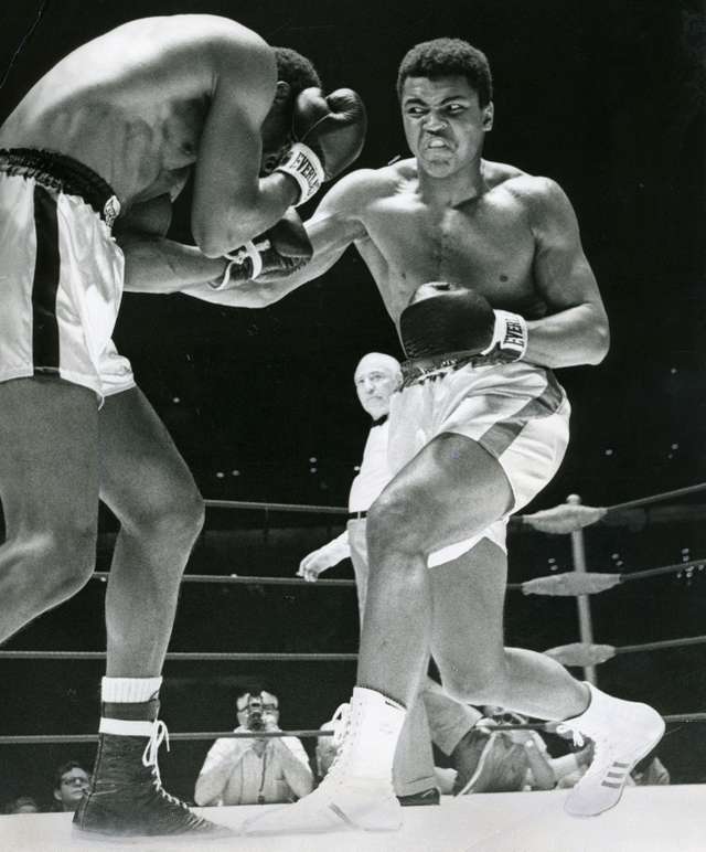 Muhammad Ali (right) fighting Ernie Terrell, 1967.