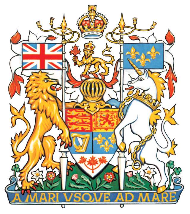 The arms of Canada, derived from the royal arms of the United Kingdom. The three maple leaves in the base, originally green, were altered to red to conform to the national flag adopted in 1965. French traditions and ties are represented by the gold fleurs-de-lis and the white lilies in the compartment.
