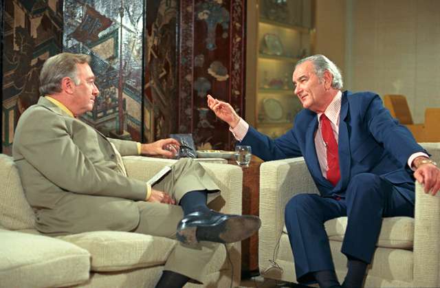 Walter Cronkite and Lyndon B. Johnson
