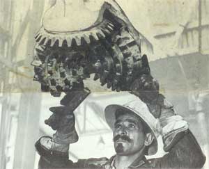 examining the drill bit