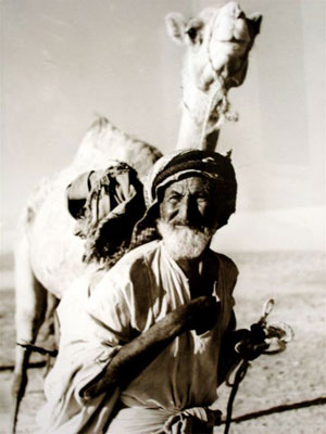 Two Bedouins  With a Camel